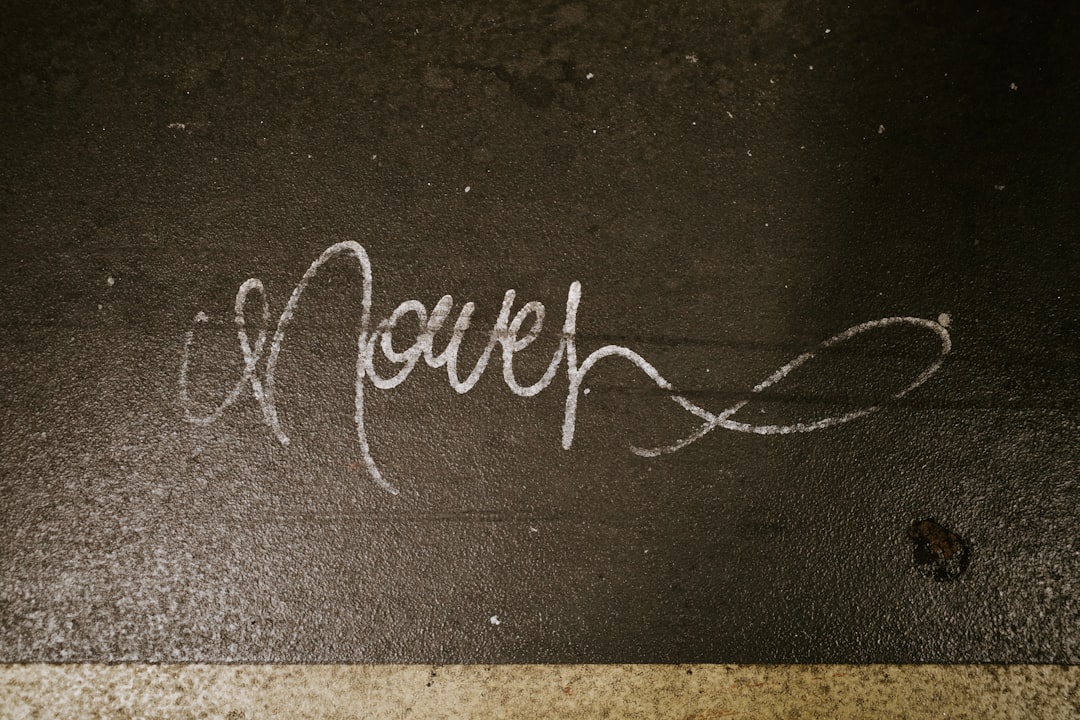 a picture of graffiti written on the ground